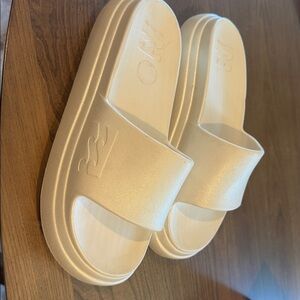 Billabong Platform Slide Sandals. So cute and fun- cream with a slight shimmer.